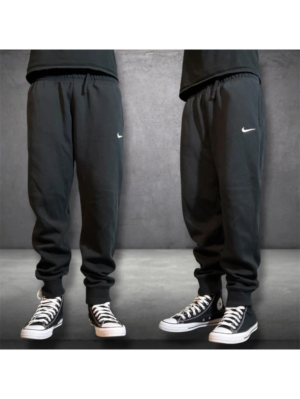 Black Nike cuffed sweatpants joggers w embroidered logo
